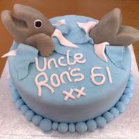 Fish Cake this cake was a last minute cake made for my uncles birthday. i made and decorated the whole cake in the space of 4 hours lol. fish is...