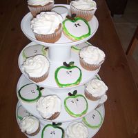 Spice Apple Cupcakes Spice apple cupcakes with coordinating sugar cookies made to look like sliced apples.