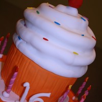 Cupcake This cake was 13 in high. Chocolate with chocolate ganache. Everything is edible.