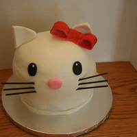 Hello Kitty Carved Hello Kitty cake, fondant covered and fondant accents.