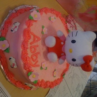 Hello Kitty This cake was a chocolate cake with butterceam icing and gumpaste flowers.