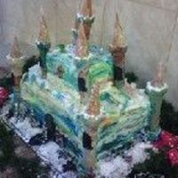 Youngstone 2007 Christmas Castle This was one of my larger cakes 4 full sheets two chocolate layers ,1 marble layer, 1 yellow layer. Each Filled. The company Chrsitmas...