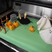 Hallowe'en Cake Just a little something that I threw together on short notice for a friend.9X13 Cake iced in BC and covered in MMF. All figures done in...