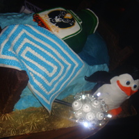 Putting The Jager To Bed This is a Jager bottle laying in a bed with a baby blanket and a penguin hiding a "disco stick" under the bed. It was made with...