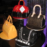 Designer Handbags A customer celebrating her 40th in style! A Prada, Chanel, Hermes and a Louis Vuitton handbag cake. Half-Baked Ideas Inc.Toronto