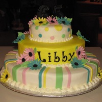 Lots Of Color! Buttercream with fondant accents. I couldn't wait to use my new funky alphabet cutters on this cake - I love the cutters!