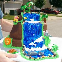 Meet Me At The Watering Hole This cake was done for a client who was having a safari themed b-day. The little b-day girl loves waterfalls and insisted that Dora &...