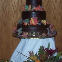 Autumn Wedding Cake I did this cake for my brother's wedding in 2005, I just came across the picture recently. Cracked chocolate ganache icing. (It was a...