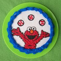 Elmo Baseball Birthday Cake This was a little 6" smash cake that I made for a first birthday party. The theme was sports but they wanted Elmo on the little cake...