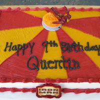 Iron Man Here is an Iron Man cake I did. The Iron man is on a base that lights up and he flies around when you push a button.