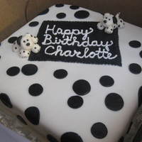 Black And White Dalmation Birthday Cake White Cake with Raspberry Filling, Vanilla Icing, and Marshmallow Fondant!