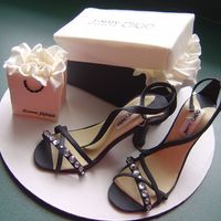 Shoe, Bag, Box Cake Topper I uploaded shoes earlier, I finally got the shopping bag and shoe box to complete the job. All are made out of gumpaste.