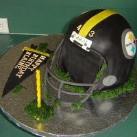 Steeler Helmet Cake This was what resulted after a toppled cake the morning it was due. I had such help from many on the forum that I got this done and it...