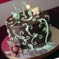 Monkey Giraffe Shower Cake Chocolate & Vanilla layers, colored buttercream icing. Was really difficult to get the brown color. Didn't use cocoa but it...