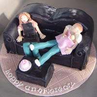 Tired Anniversary Anniversary cake for my BIL/SIL with new baby. Chocolate cake covered in ganache and fondant. All characters fondant/Tylose. Tough to keep...