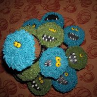 Monster Cupcakes thanks to the great talent on this site, I made these monster cupcakes. They are just buttercream icing. The blue monsters are made using a...