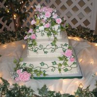 Prom Cake This was done for prom. They had a garden theme with pink roses and ivy.The cake is buttercream. The flowers and ivy are gum paste.