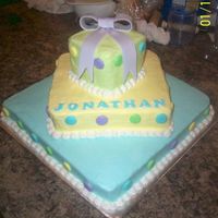 Stacked Cake All white square. Buttercream frosting, colour flow puddle drops and letters.
