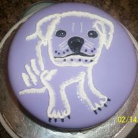 English Bulldog Pup 8x4in round coconut cake with pina colada flavored fondant and buttercream brush embroidery.