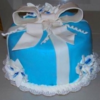 Tiffany Blue Engagement Cake Blue cake to simulate box of the engagement cake, with sugar flowers to simulate flowers given to the bride during proposal.