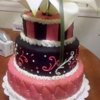 Anikos 18Th Birthday Cake done for my baby cousins 18th...I feel bad because I got inspiration from a cake I saw here on CC that had feathers on top...but I cant for...