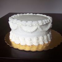 1970's Inspired This is inspired by a 1970's wilton yearbook I have. I love to older styles of decorating. This was my first time with it. Any advise...