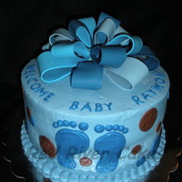 Blue Bow Gum paste bow held together by candy melts. Last minute cake came together!