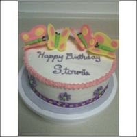 Butterfly Birthday This was a birthday cake for my little sister. The ribbon at the bottom had butterflies and flowers on it. Butterflies are fondant cut with...