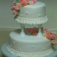 First Tiered Cake This is my final cake from Wilton Course 3. I didn't do all the roses, actually only 3 of them. I had a busy week and ran out of time...