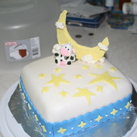 The Cow Jumped Over The Moon This was my first cake covered in fondant with gumpaste figurines and decoration!! The clouds were made of Large marshmallows that I slowly...