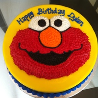 Elmo Cake Used the Wilton Elmo cake pan, piped with buttercream. Big cake covered in regular fondant.