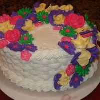 Flower And Basketweave Cake This is one of the first cakes I've made! It's my favorite because of all the bright colors of theflowers,which were all really...