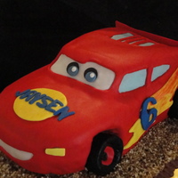 Lightning Mcqueen Bday Cake My first sculpted cake. For my godson's Bday. It was fun. I would do one again.