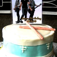 Marco's Jo Bros/drum Cake Made this for my nephew. He requested Jonas Brothers and he loves to play the drums. He is only 3 years old. This is my second fondant...