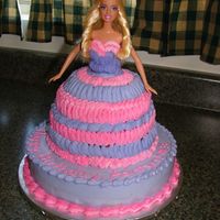 Barbie Cake Cake for niece's third birthday. She is a girlie girl and requested it have "lots" of pink and purple.