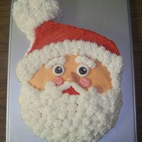 Santa Face Cake A coworker and I did this cake for our monthly birthday party at work. It was a big hit! We used the Wilton Animal Crackers cake pan, cut...