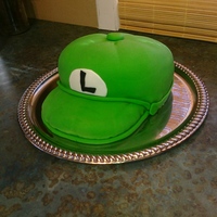 Luigi Hat Chocolate cake with peanut butter frosting covered with fondant.