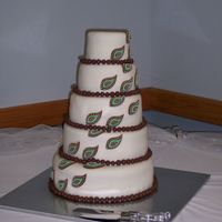 Paisley Wedding Cake This cake was requested by my niece for her wedding. Brown and green paisley. White and chocolate cake with buttercream icing covered with...