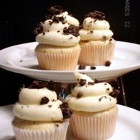 Mini Cookies And Cream Cupcakes cookies & cream batter, cream cheese icing, cookie crumbles