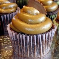 Peanut Butter Cupcake Chocolate cake with caramel piped in middle with peanut butter frosting.