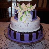 Chocolate & Lavender Calla Lily Anniversary I only used one layers for this cake because I wanted the stacked look w/o all the cake. The top and bottom layers are covered in chocolate...