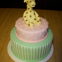 Baby Giraffe 6" & 8" stacked round tiers. Baby giraffe sculped out of fondant.