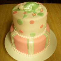 Sleeping Baby Anne Geddes is the inspiration behind this cake.