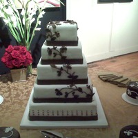 Five Tier Wedding With Vine This is the largest wedding cake that I have made. It is five tiers tall with the top, middle and bottom cakes being rum cake and the...