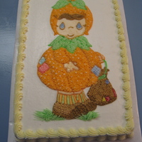 Precious Moments Pumkin Girl 1/2 sheet yellow cake, iced in buttercream