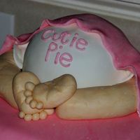 Baby Bum Cake I copied this from all the photos here. The cake was made with a Pampered Chef Large Batter Bowl. I covered it with fondant and made legs,...