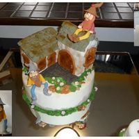 My Elfs Village This cake is hand made from cake to elfs. The cake is marble cake, chocolate and orange cake. The houses are cake cover with fondant and...