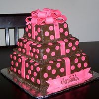 100_2881.jpg First fondant bow. Chocolate cake, chocolate buttercream.