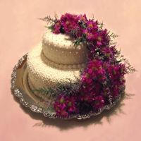 Wedding Aniversary Fondant covered 2-tier stacked cake. BC accents. Fresh flowers per client's request