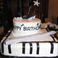Musical B-Day Cake This cake was for my two nieces...one who loves to play the piano and the other who loves to play the flute. They loved it!